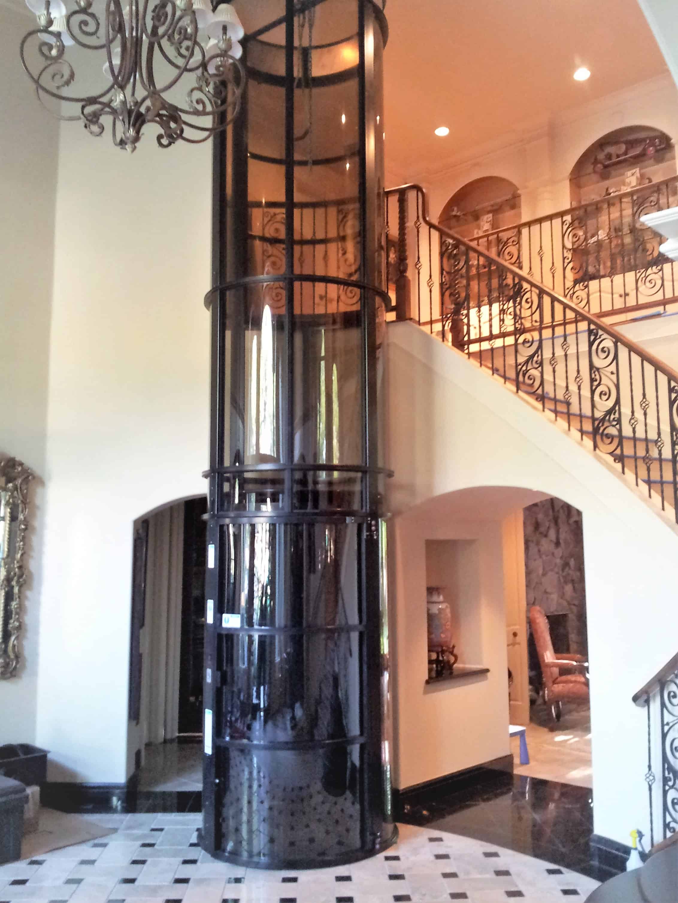 2-story vacuum elevator installed in the foyer of a luxury home in bellaire texas