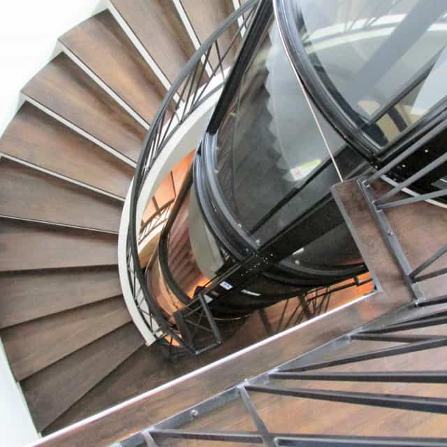 panoramic vacuum elevator installed in a circular stairwell in an upper kirby residence in houston texas