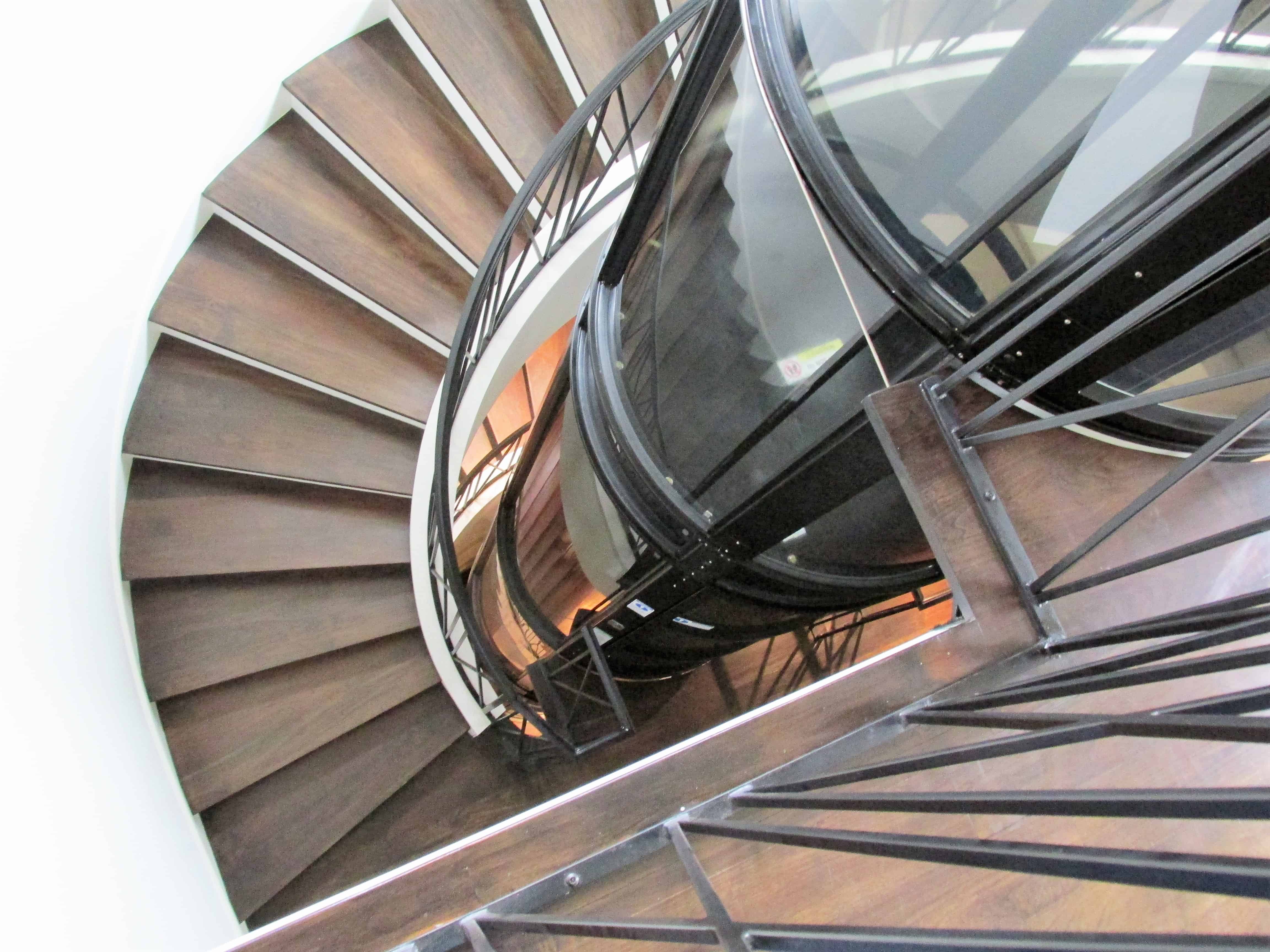 panoramic vacuum elevator installed in a circular stairwell in an upper kirby residence in houston texas