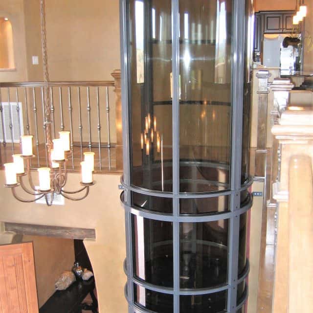 vacuum elevator with grey trim installed in the foyer of a Woodlands Texas home