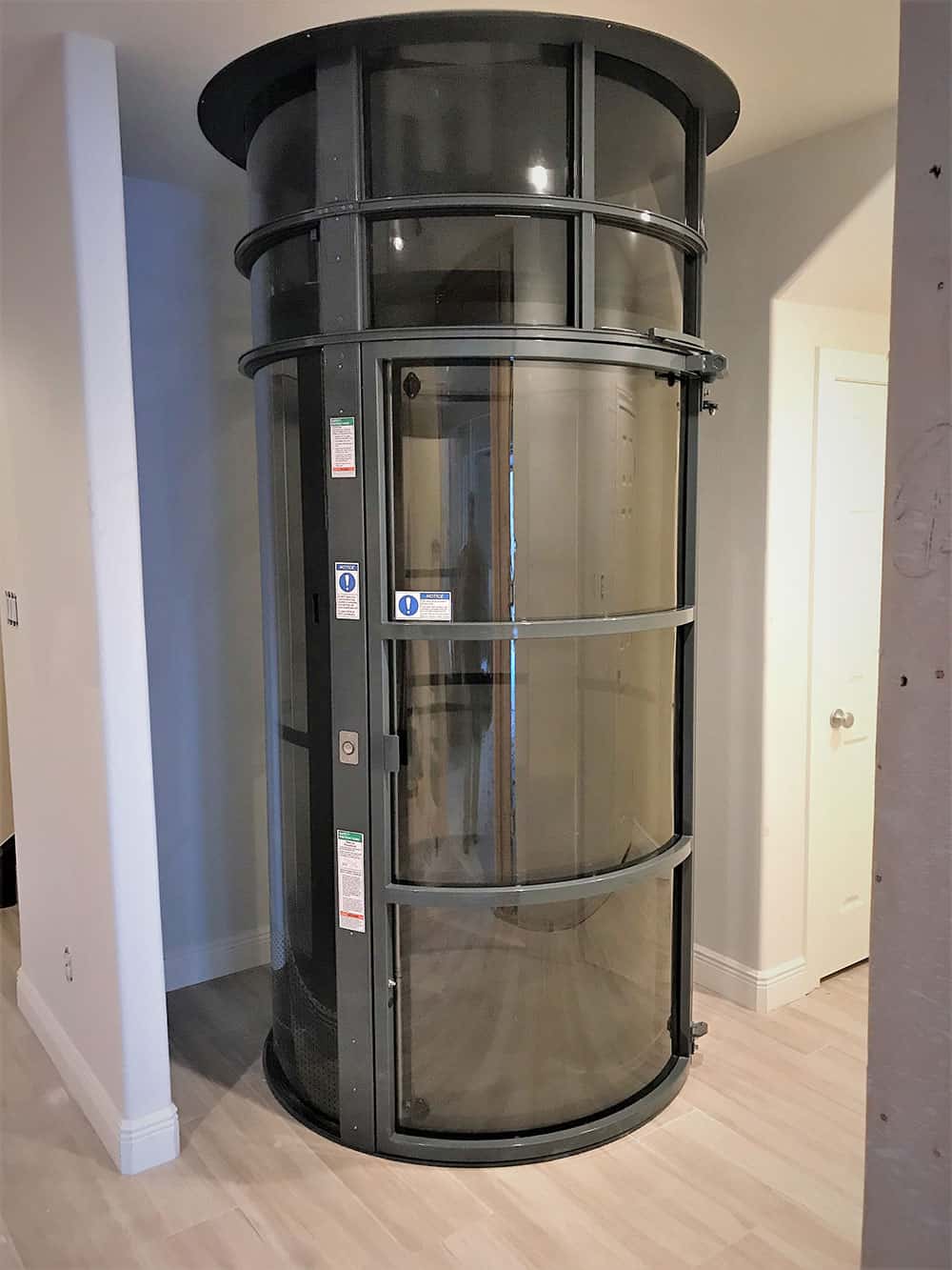 Bottom level of a pve52 wheelchair elevator installed in a houston area home