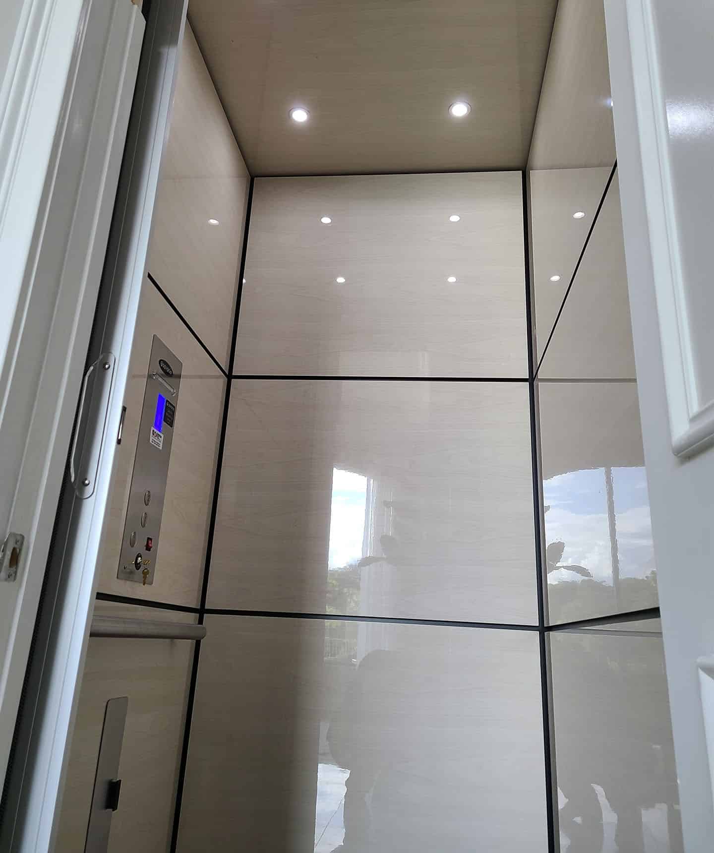 savaria luxury home elevator with high-gloss mdf interior panels